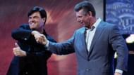 Eric Bischoff shaking Vince McMahon's hand to be General Manager of RAW